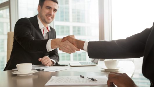 partners-shaking-hands-after-singing-contract.jpg